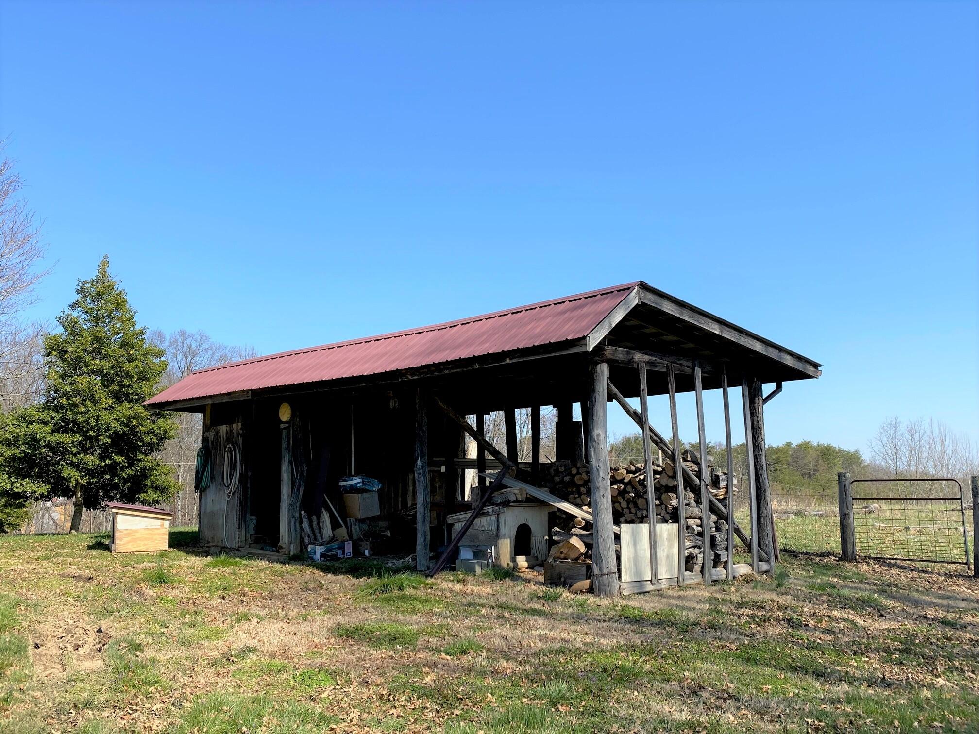 535 Cocke County Road Greeneville, TN 37743 - Photo 49 of 54 McClure Wood Shed