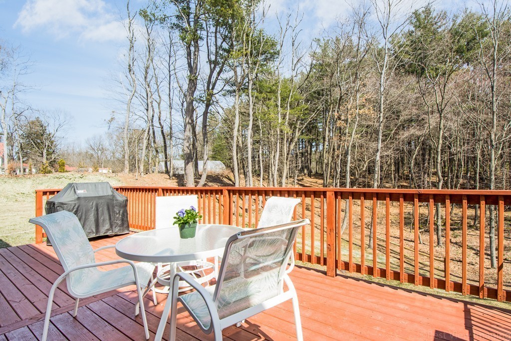 42 White Pond Road Stow, MA 01775 - Photo 22 of 26 a view of a chairs and table on the patio