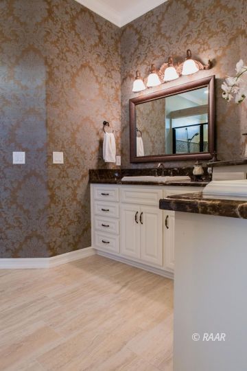 430 West Javis Avenue Ridgecrest, CA 93555 - Photo 23 of 35 a bathroom with a sink and a mirror