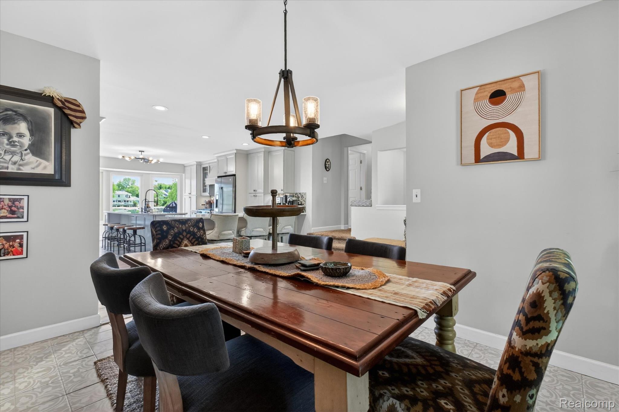 3860 East Commerce Road Commerce Township, MI 48382 - Photo 22 of 72 Dining area with tile flooring and a multi-light chandelier