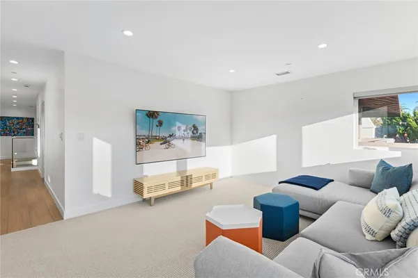 a living room with furniture and a couch