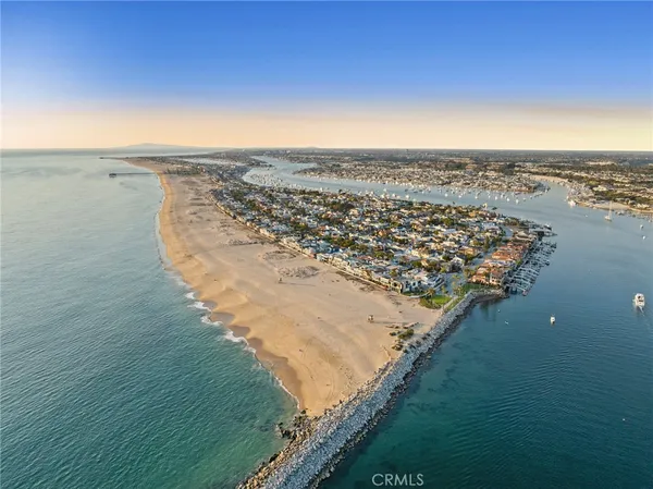 an aerial view of beach and ocean