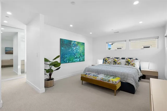 a bed room with a bed and a couch