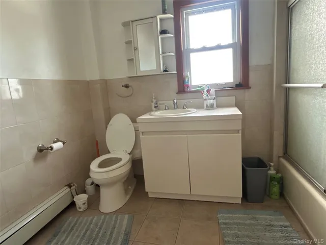 a view of bathroom with a sink and a toilet