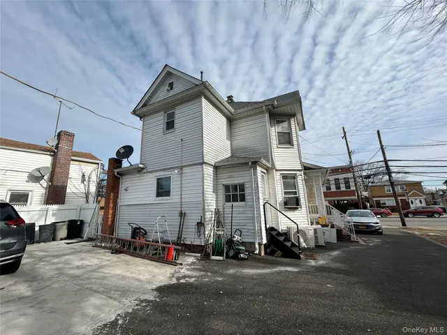 a view of a street with cars