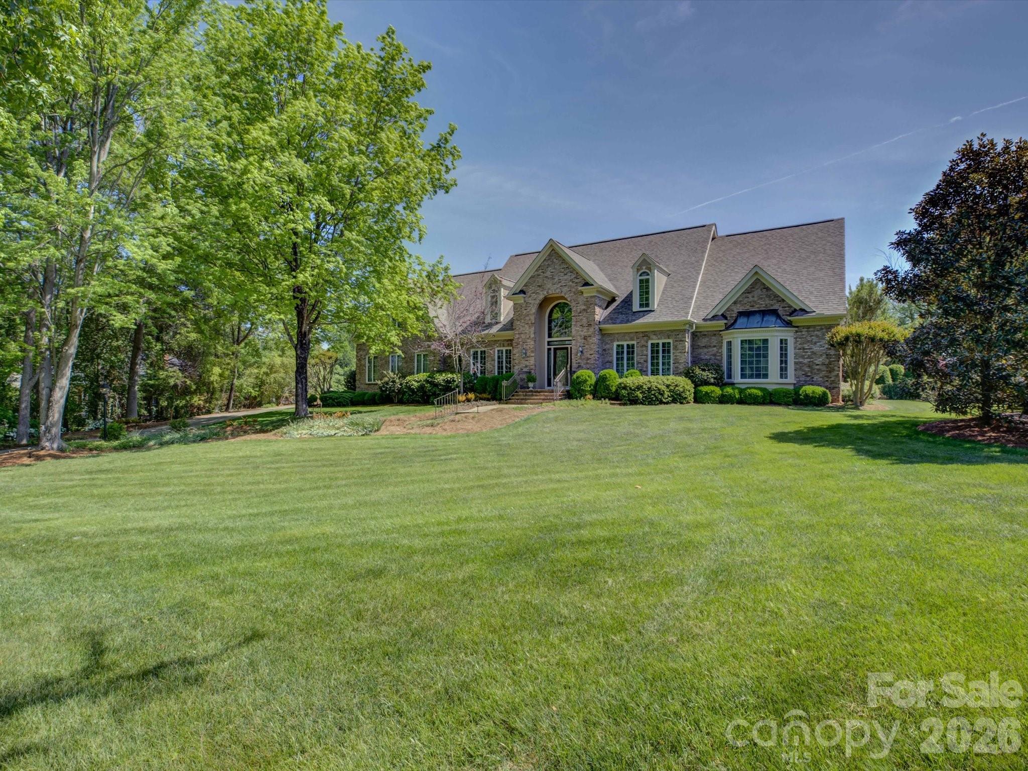 2980 Robinwood Road Gastonia, NC 28054 - Photo 2 of 48 a front view of house with yard and green space