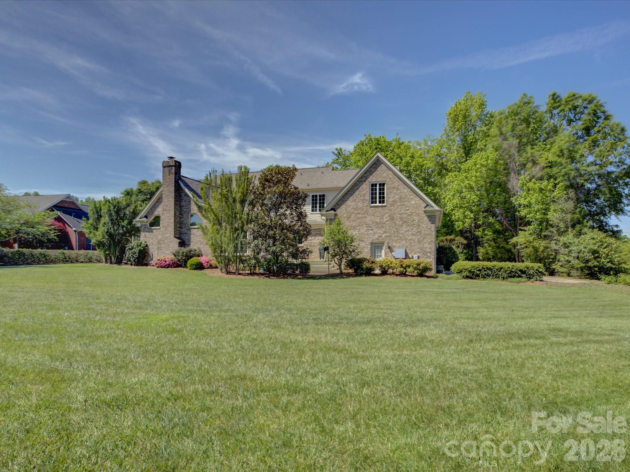 2980 Robinwood Road Gastonia, NC 28054 - Photo 48 of 48 a front view of a house with garden