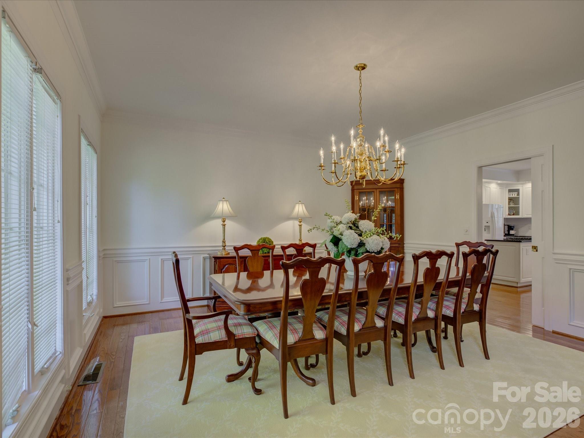 2980 Robinwood Road Gastonia, NC 28054 - Photo 7 of 48 a view of a dining room with furniture and chandelier