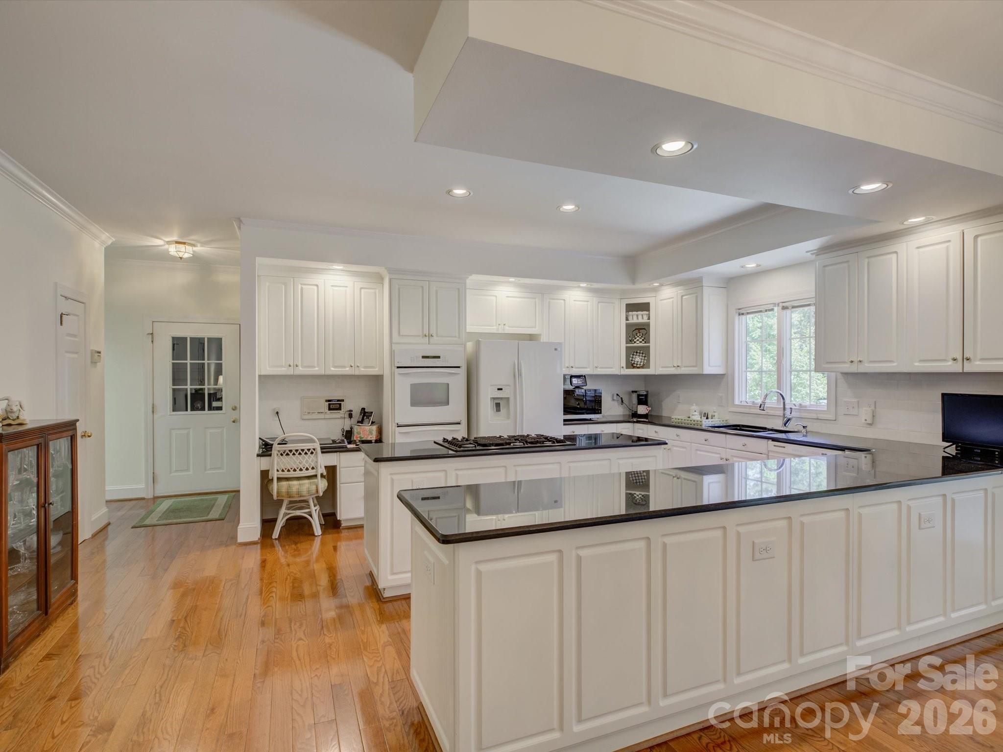 2980 Robinwood Road Gastonia, NC 28054 - Photo 9 of 48 a large kitchen with kitchen island lots of counter space a sink and appliances