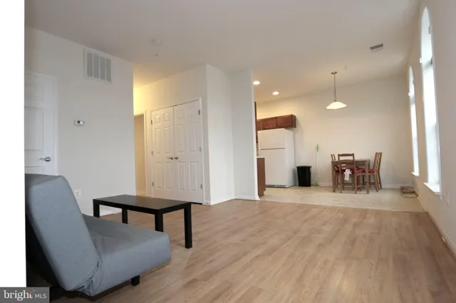 a view of a livingroom with furniture and a couch