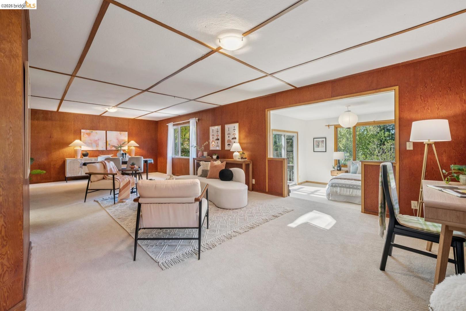 155 Avenida Drive Berkeley, CA 94708 - Photo 45 of 86 Wood paneling throughout, light-toned carpeting, wood-paneled ceiling with grid detailing, recessed lighting, and a broad cased opening