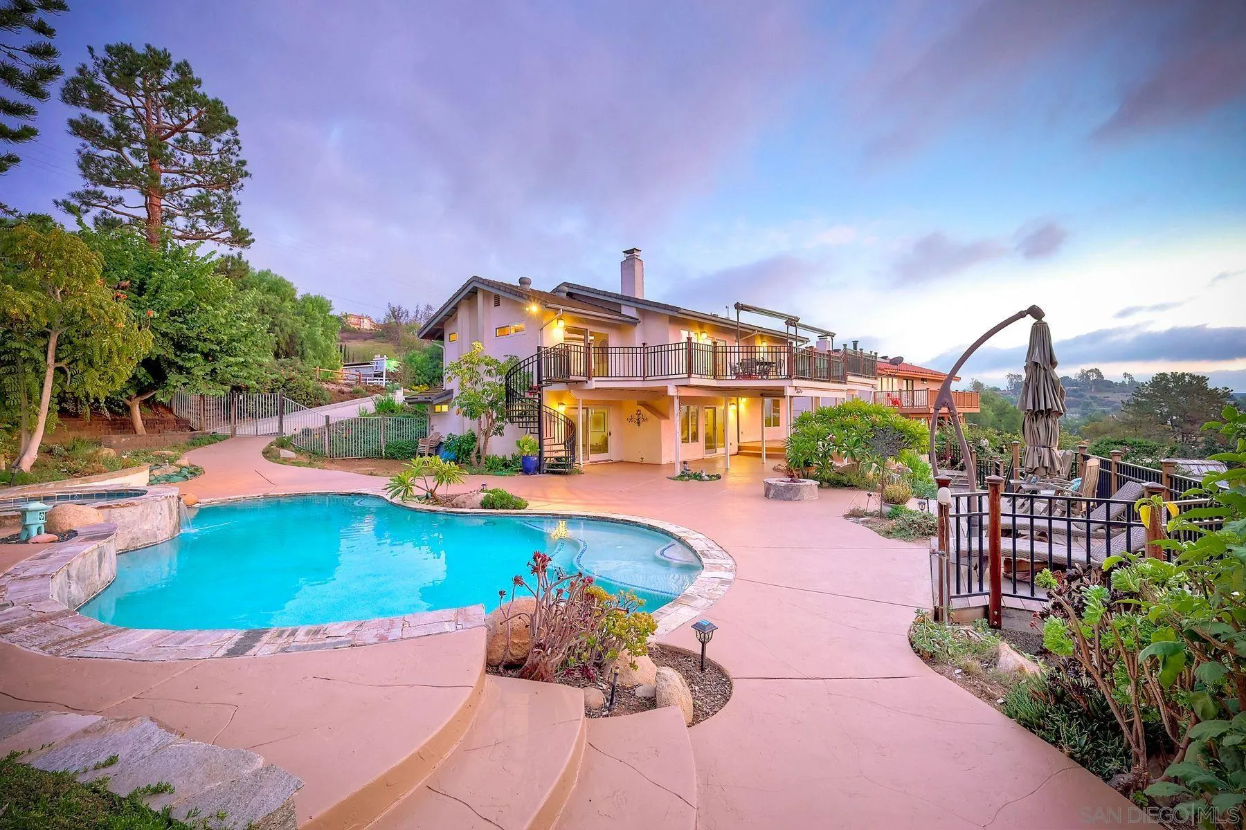 14036 Tierra Bonita Road Poway, CA 92064 - Photo 19 of 57 a view of a swimming pool with a patio