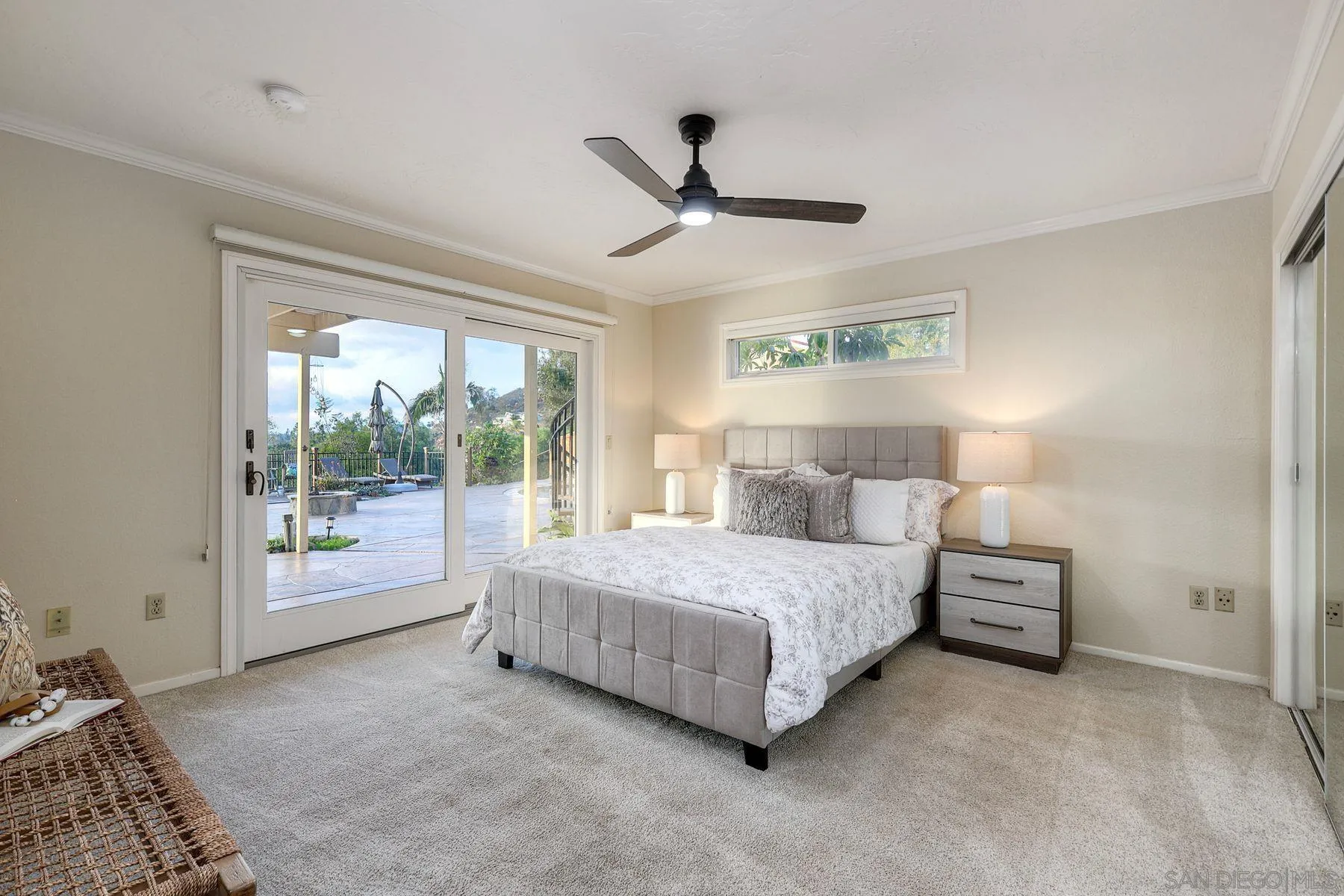 14036 Tierra Bonita Road Poway, CA 92064 - Photo 21 of 57 a spacious bedroom with a bed and a large window