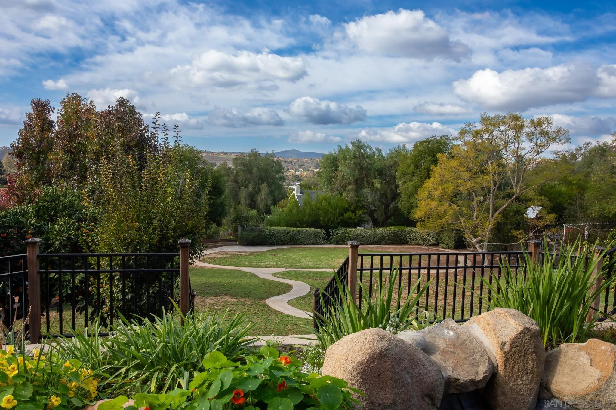 14036 Tierra Bonita Road Poway, CA 92064 - Photo 32 of 57 a view of a roof deck with couches and sky view