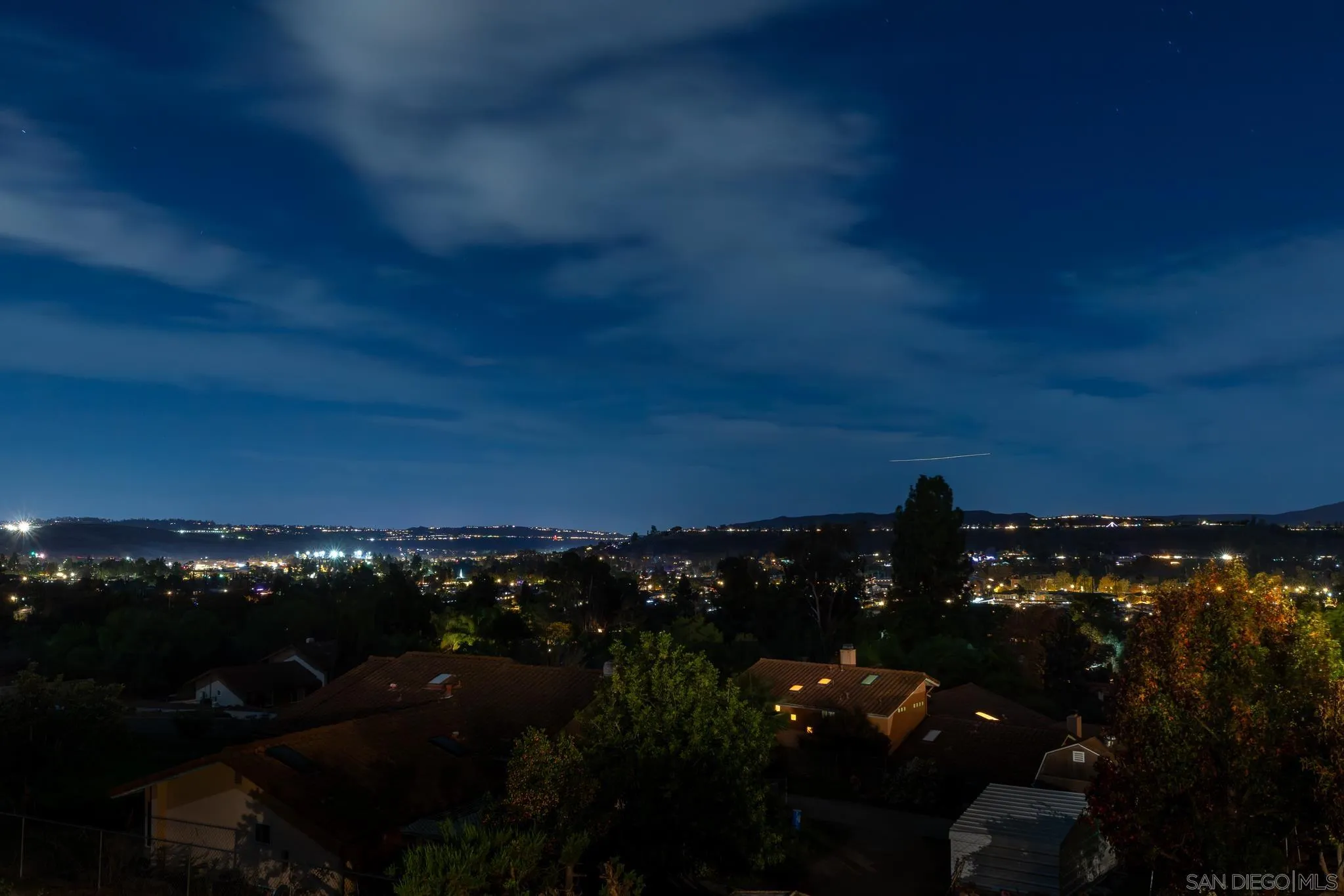 14036 Tierra Bonita Road Poway, CA 92064 - Photo 33 of 57 a view of city and sunset
