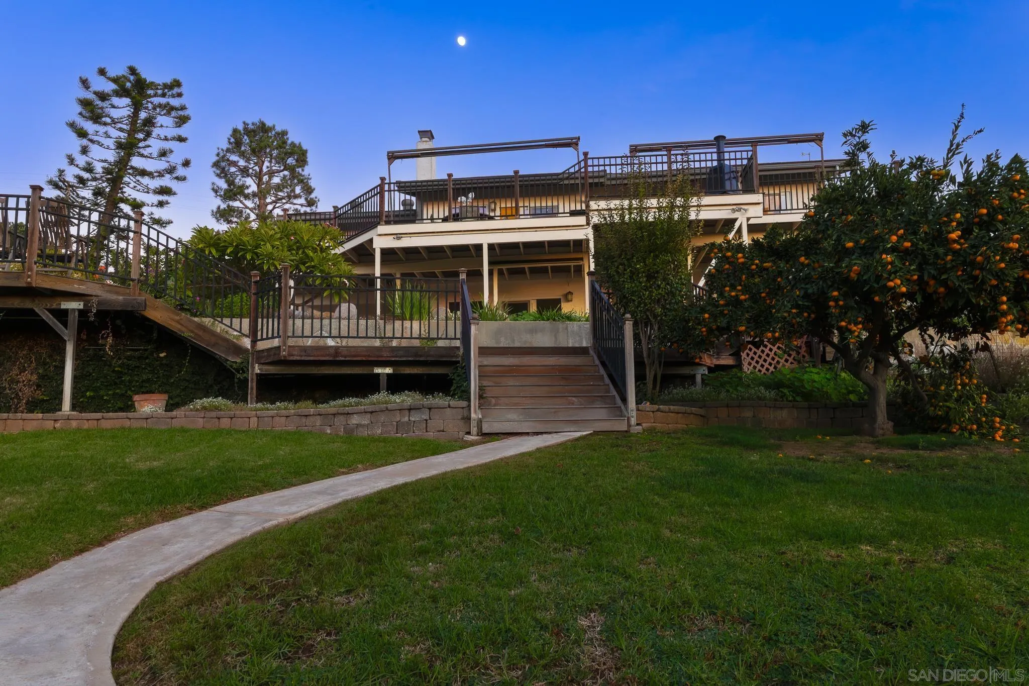 14036 Tierra Bonita Road Poway, CA 92064 - Photo 35 of 57 a view of a house with a yard