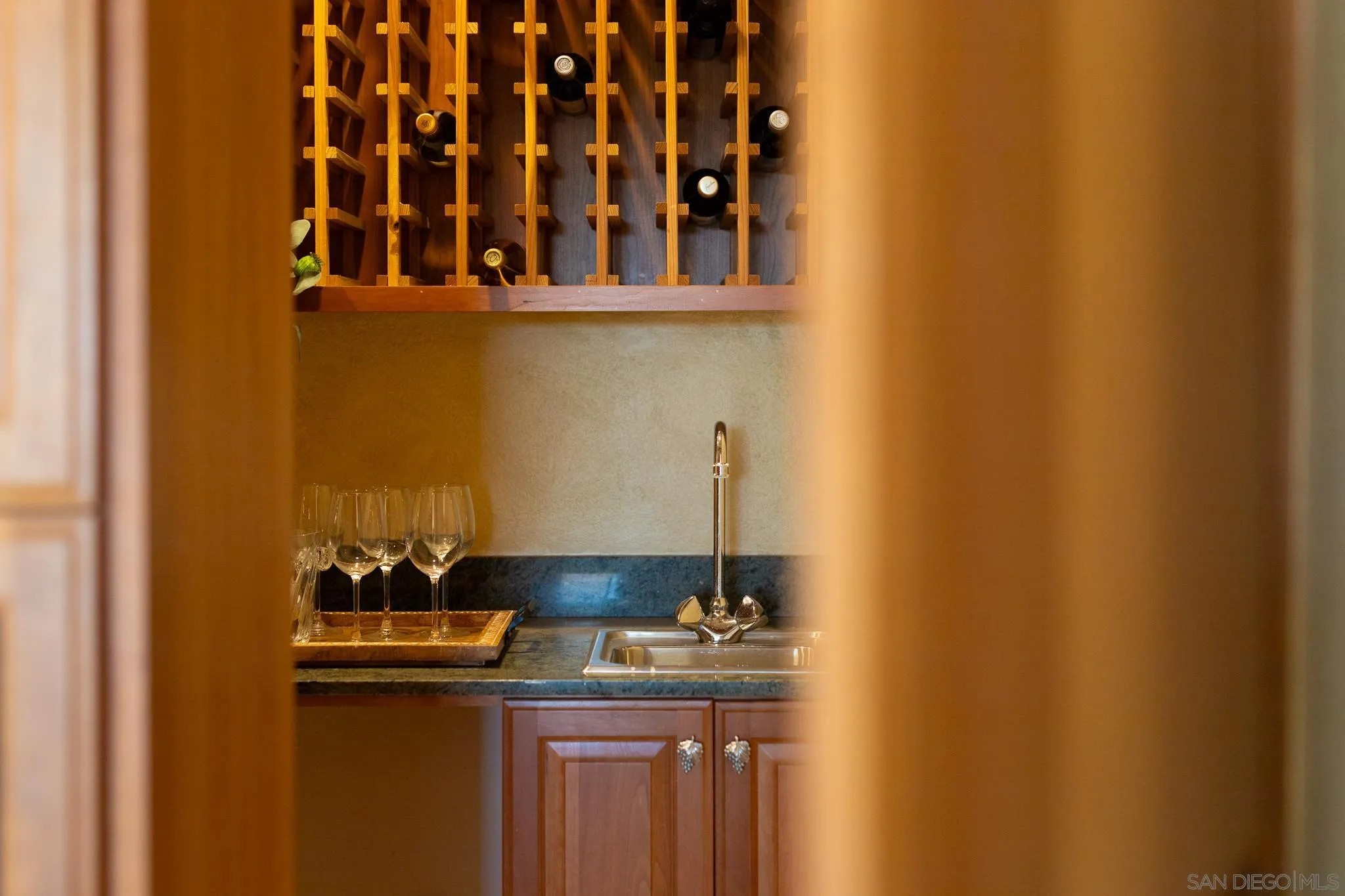 14036 Tierra Bonita Road Poway, CA 92064 - Photo 56 of 57 a kitchen with a sink and cabinets