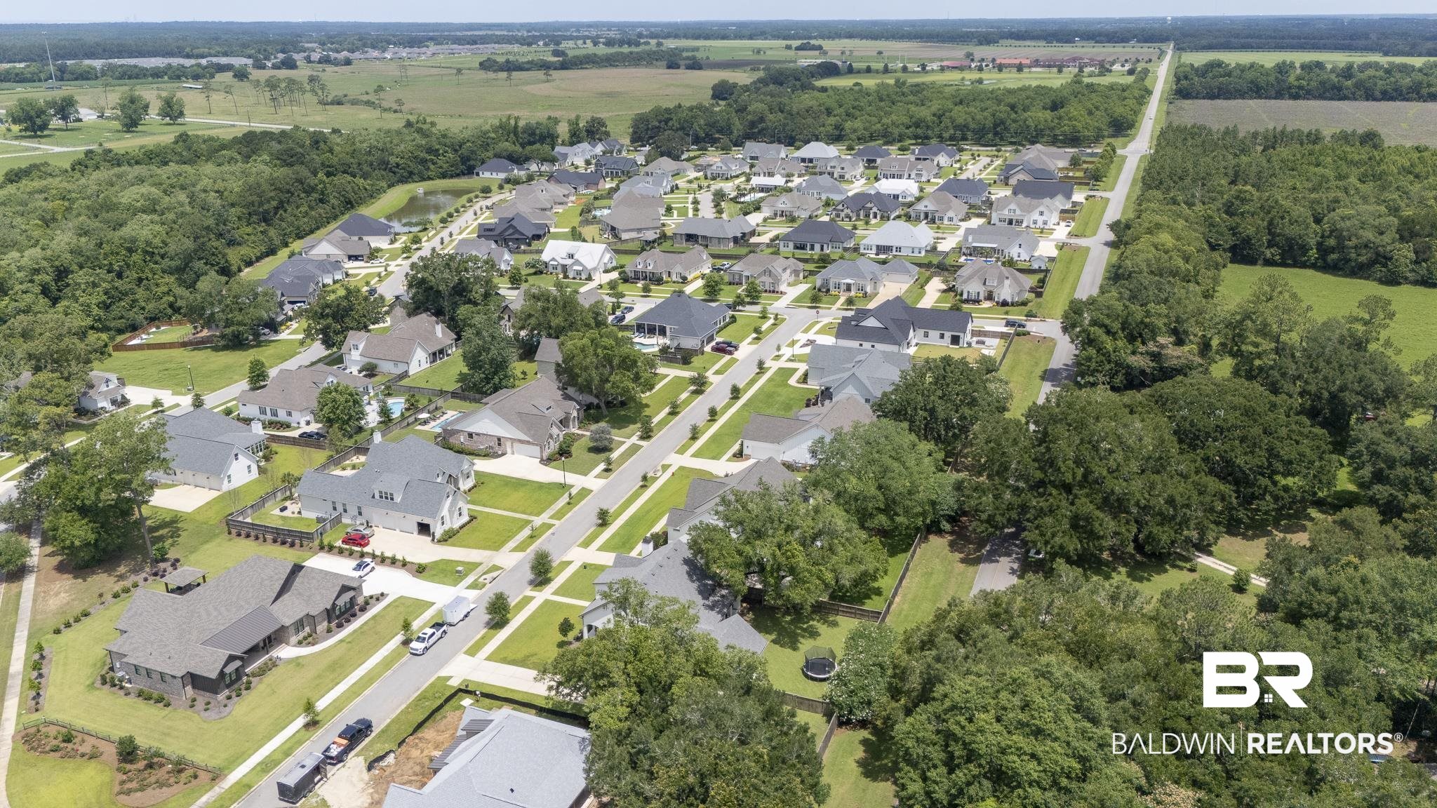 21702 Pillars Street Fairhope, AL 36532 - Photo 51 of 54 Aerial perspective showcasing a residential community with varied architectural styles