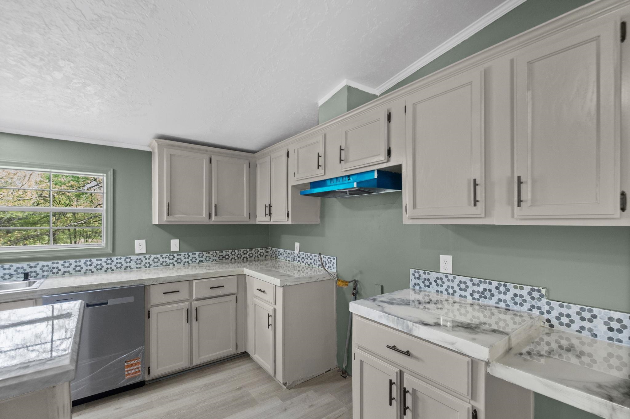 145 Walnut Bend Road Arlington, TN 38002 - Photo 11 of 30 a kitchen with granite countertop white cabinets and white appliances