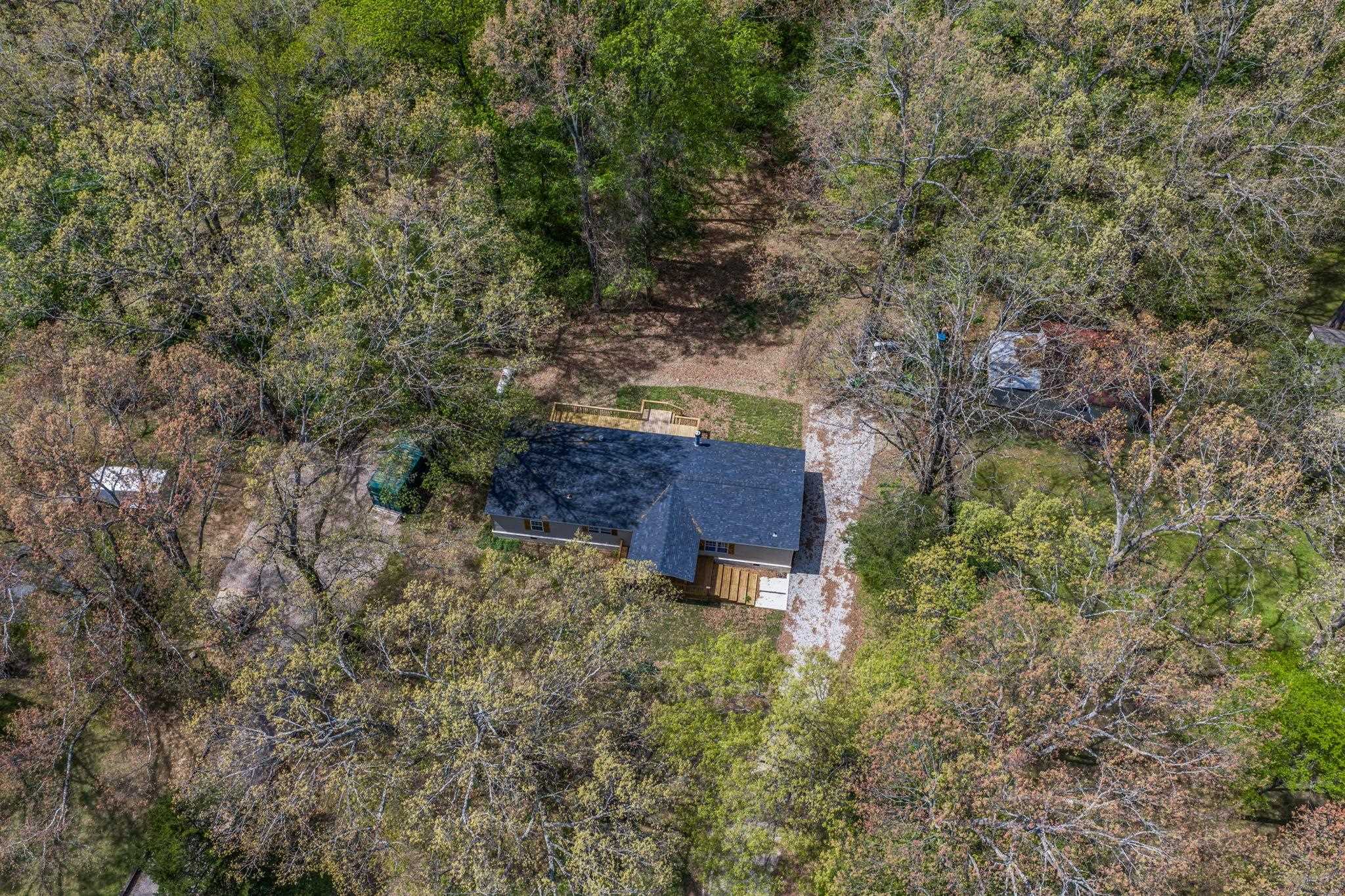 145 Walnut Bend Road Arlington, TN 38002 - Photo 25 of 30 a view of a wooden fence with a bench