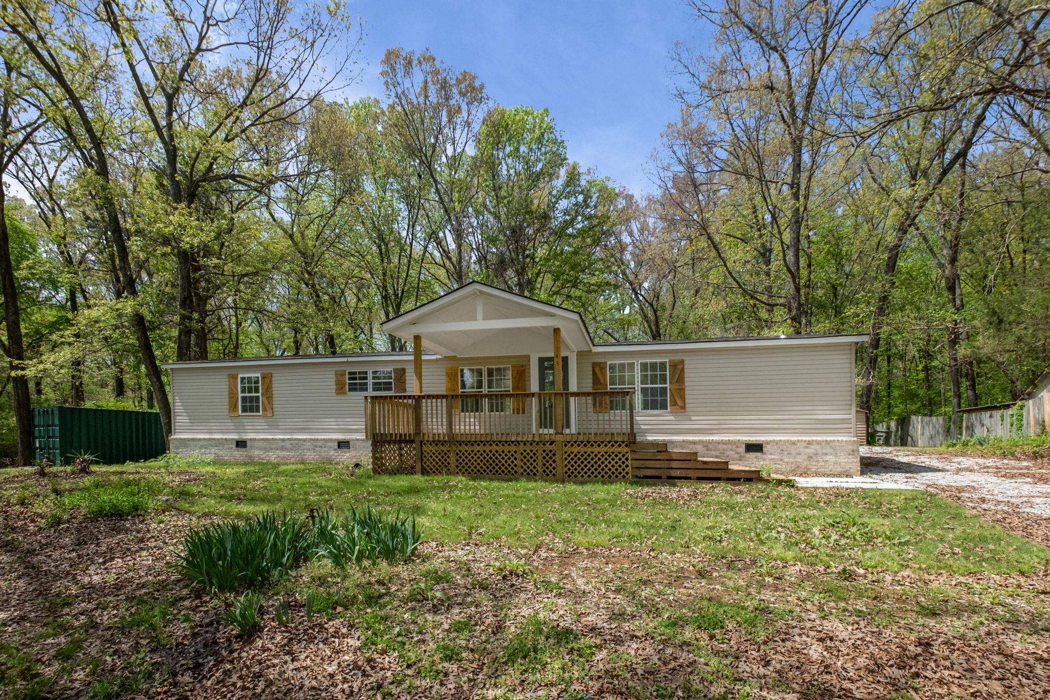145 Walnut Bend Road Arlington, TN 38002 - Photo 29 of 30 a view of a house with yard and a tree