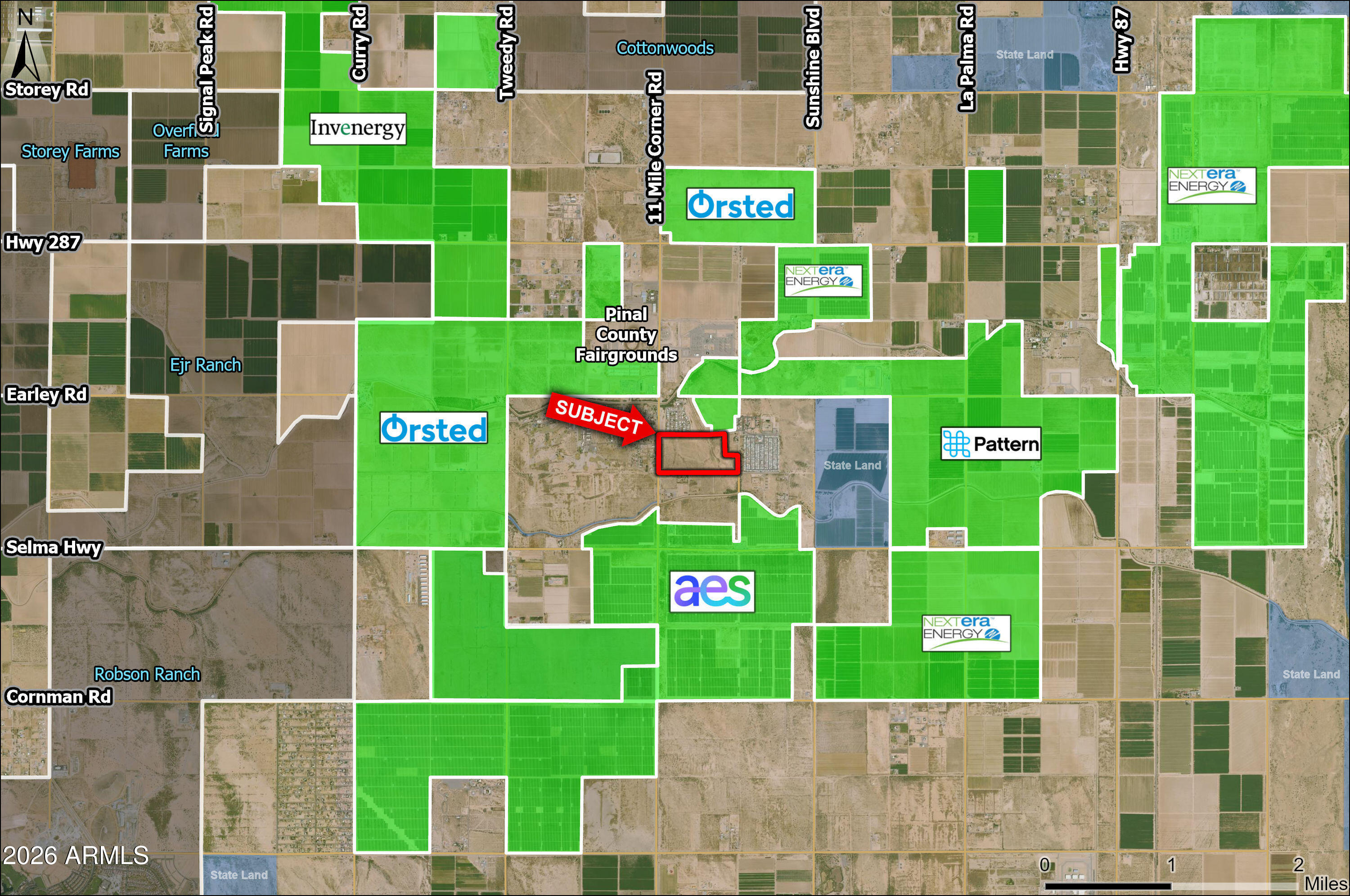 0 South 11 Mile Corner Road Casa Grande, AZ 85194 - Photo 1 of 3 a green field with tall buildings