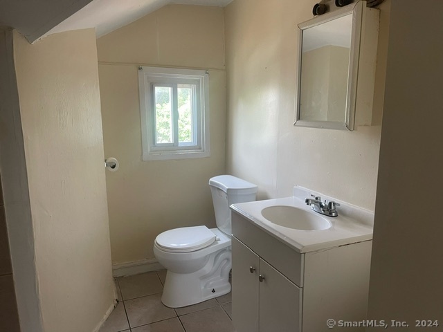 24 Arthur Street New Haven, CT 06519 - Photo 8 of 14 a bathroom with a sink and a toilet