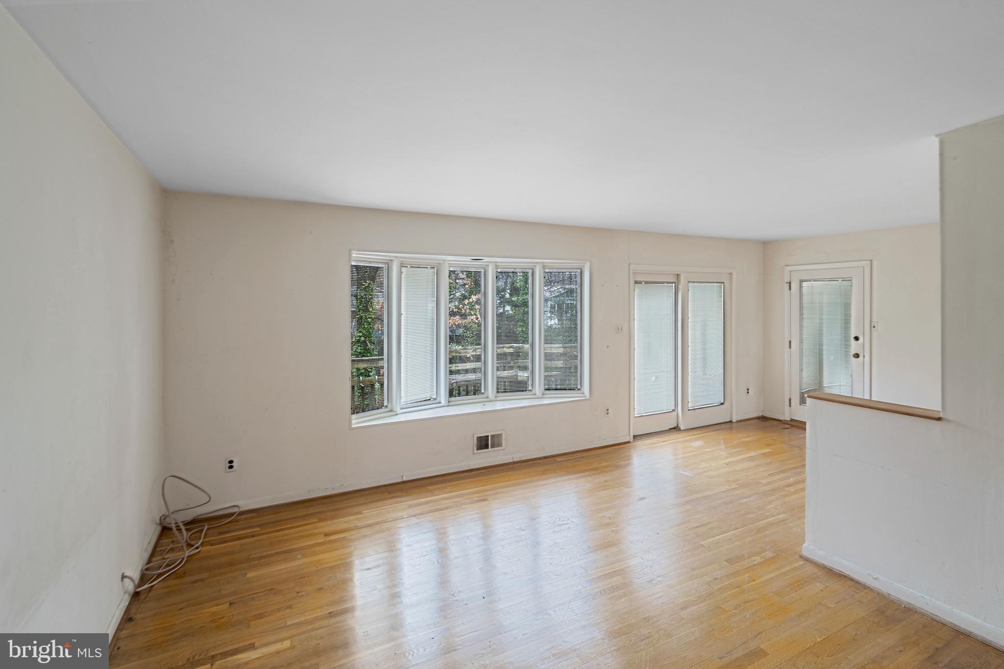 6604 Cipriano Road Lanham, MD 20706 - Photo 18 of 33 Living room with hard wood floors