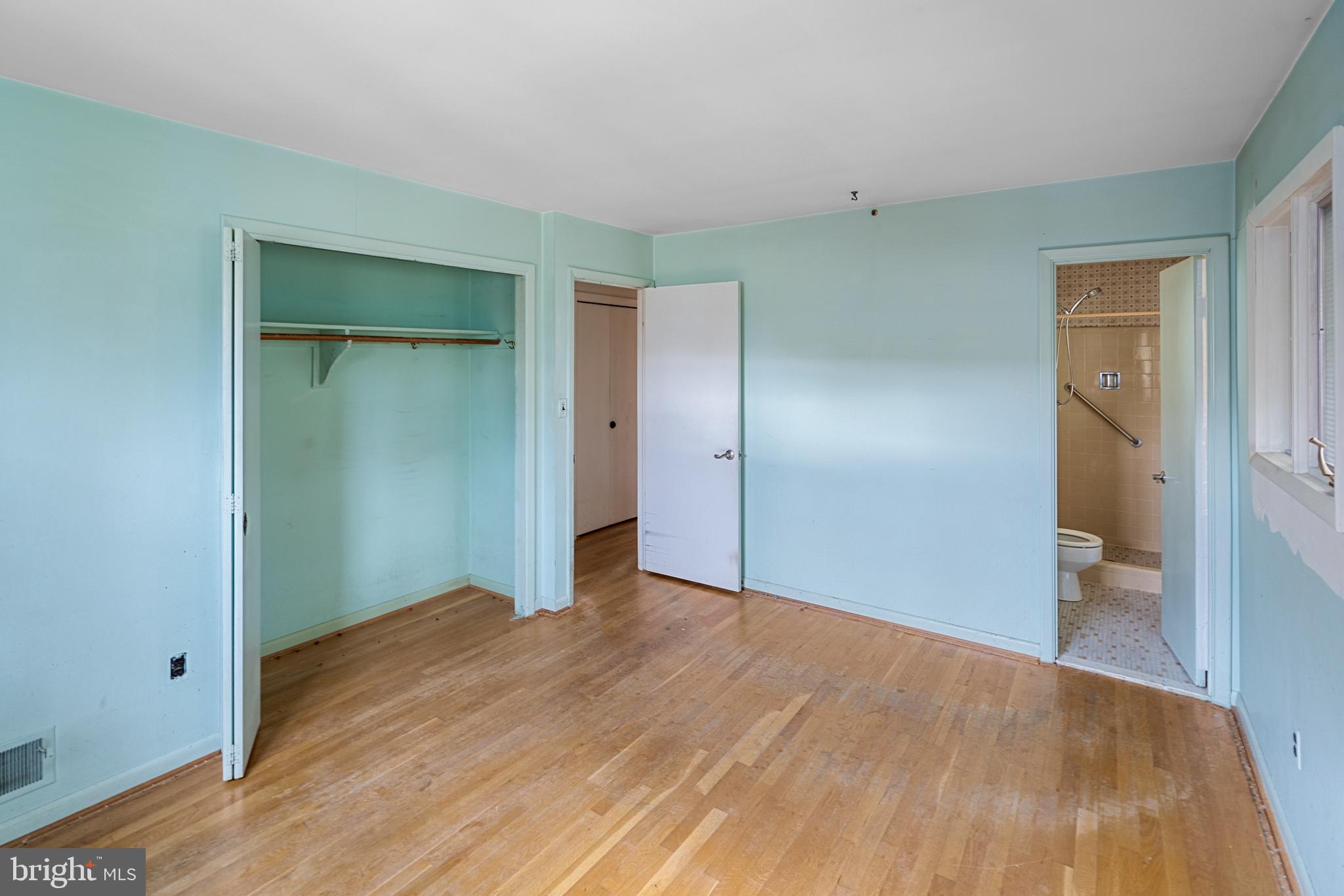 6604 Cipriano Road Lanham, MD 20706 - Photo 20 of 33 Master Bedroom & View of Bathroom