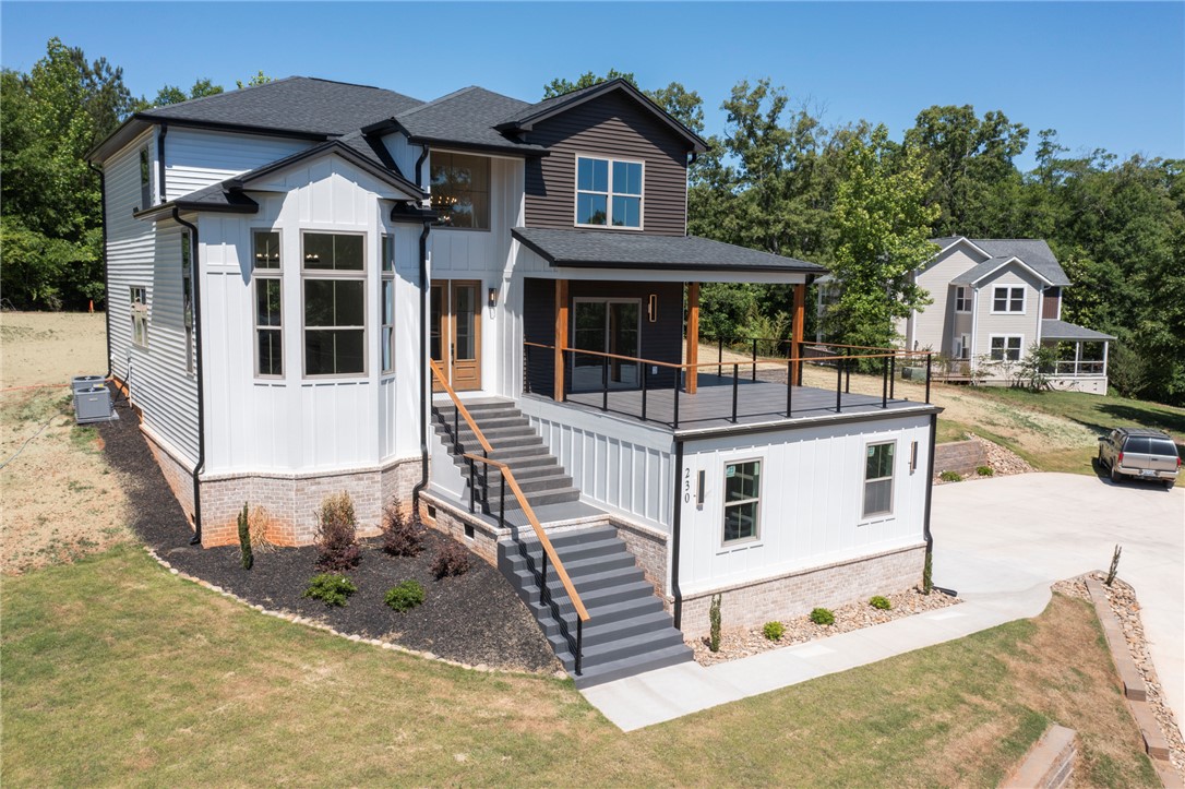 230 Hammond Circle Anderson, SC 29621 - Photo 1 of 48 This home features a charming exterior with a spacious deck, perfect for outdoor living.