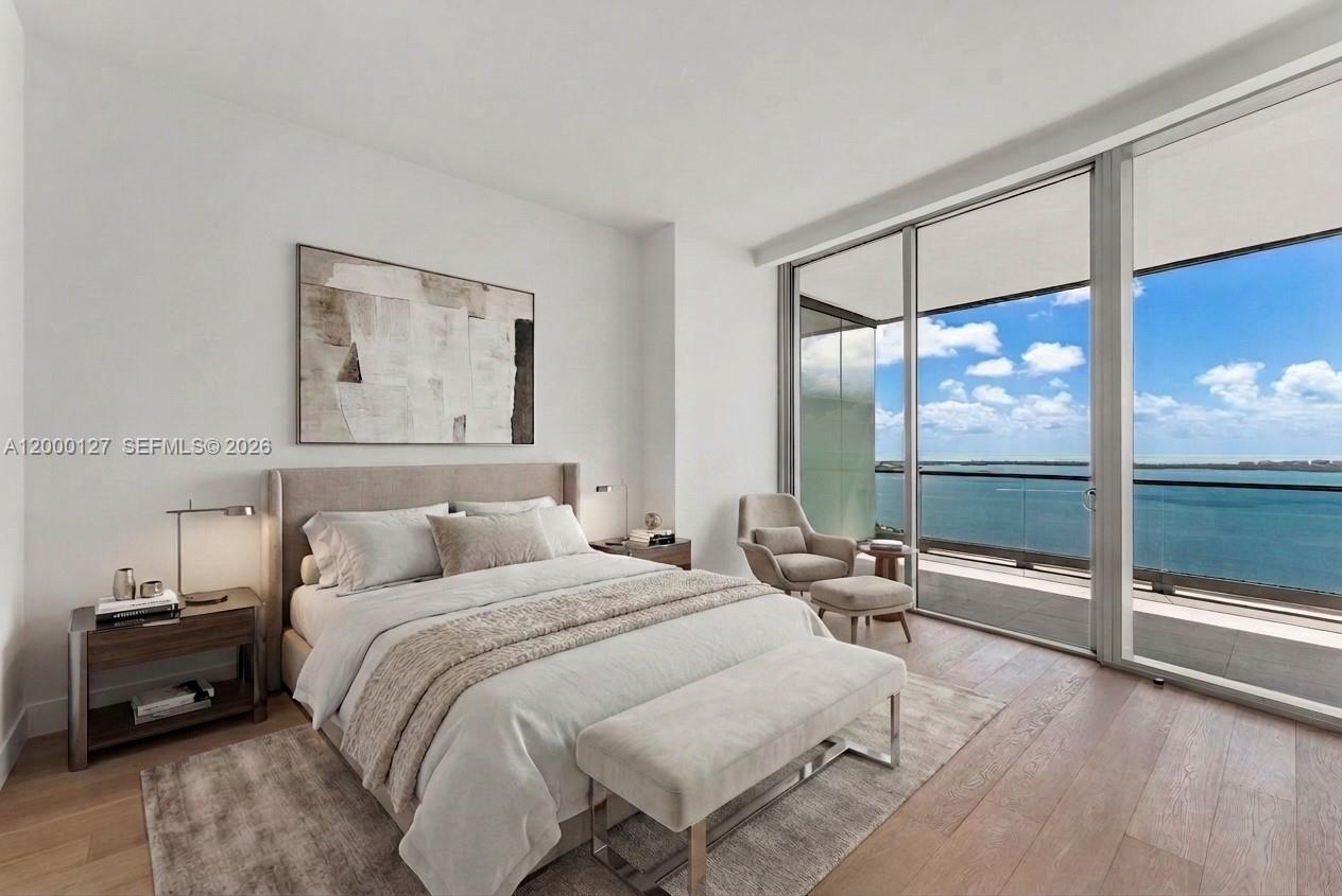 175 Southeast 25th Road, Unit 3602 Miami, FL 33129 - Photo 5 of 26 a bedroom with a bed and a large window