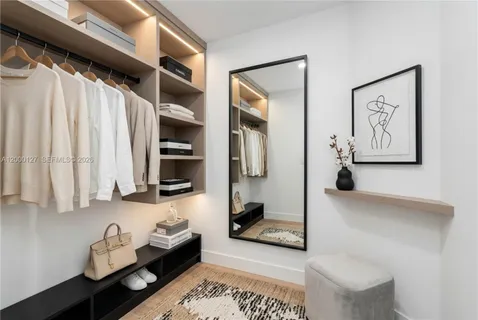 a room with furniture and a window