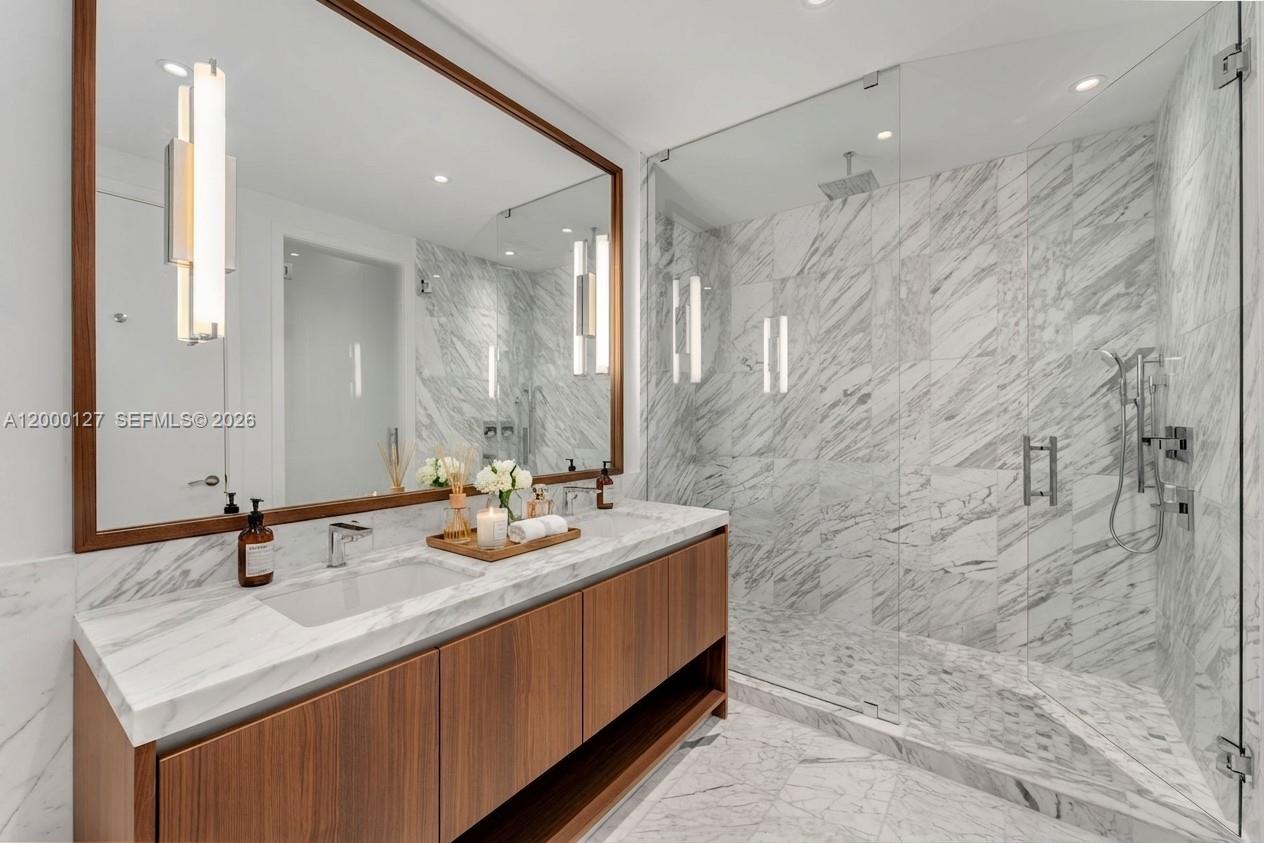 175 Southeast 25th Road, Unit 3602 Miami, FL 33129 - Photo 8 of 26 a bathroom with a sink double vanity and a mirror