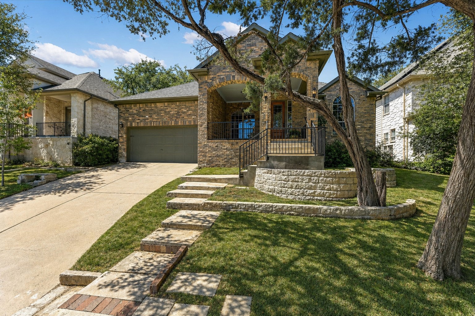 8024 Cobblestone Austin, TX 78735 - Photo 2 of 31 Reimagined front with clean landscape and beds