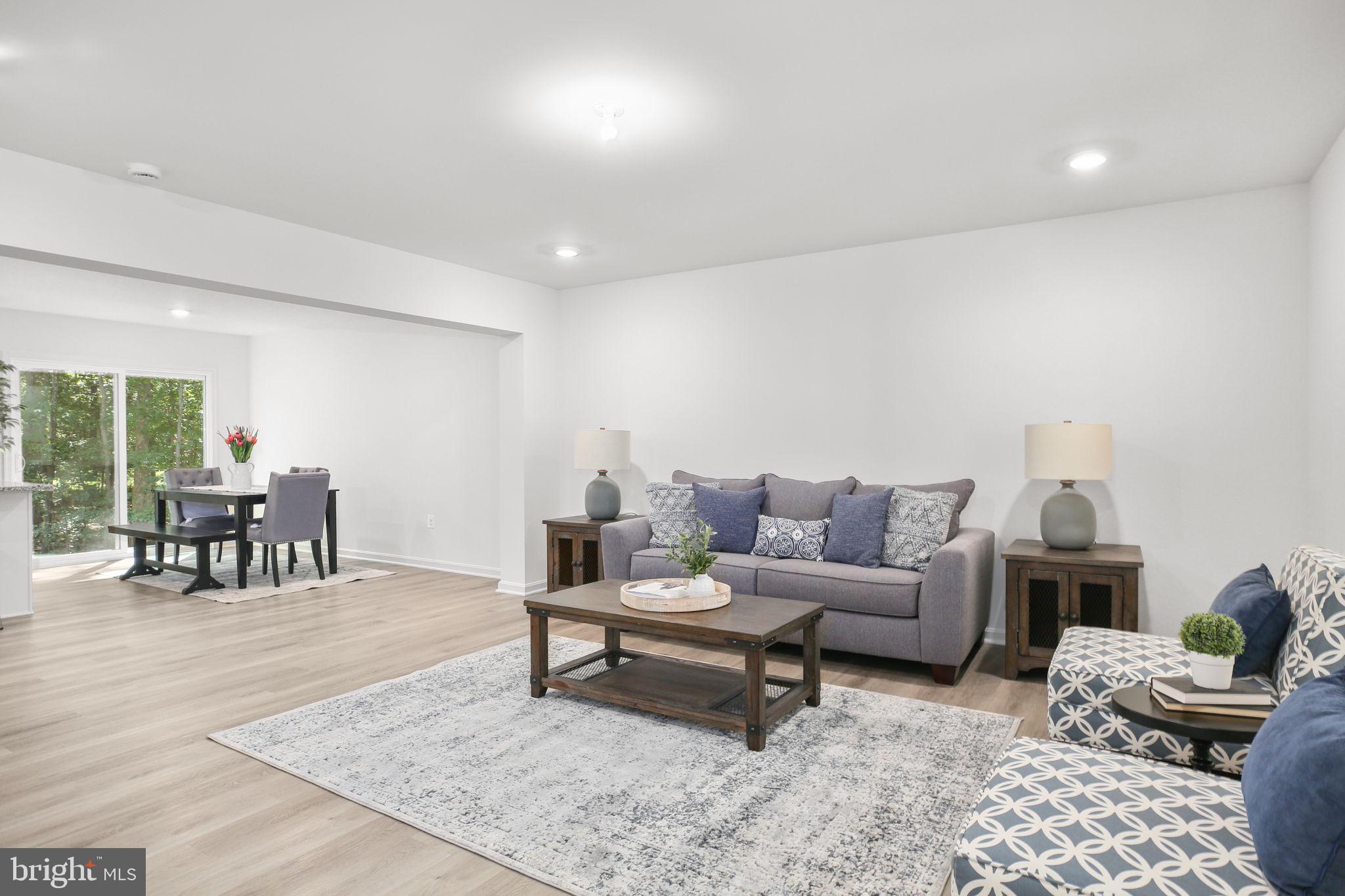 5 Indiantown Road King George, VA 22485 - Photo 11 of 18 a living room with furniture and a rug
