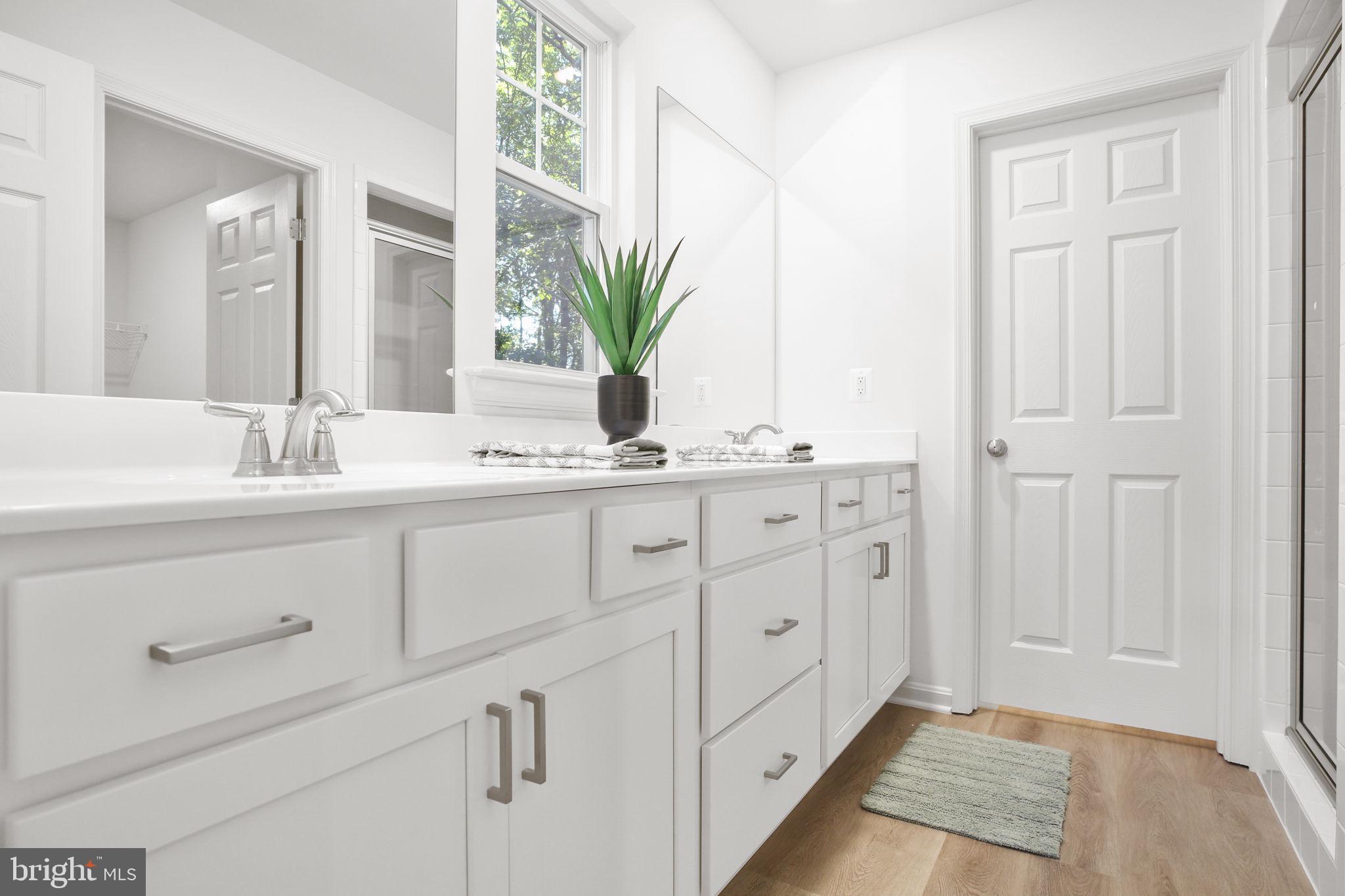 5 Indiantown Road King George, VA 22485 - Photo 15 of 18 a bathroom with a sink and a mirror