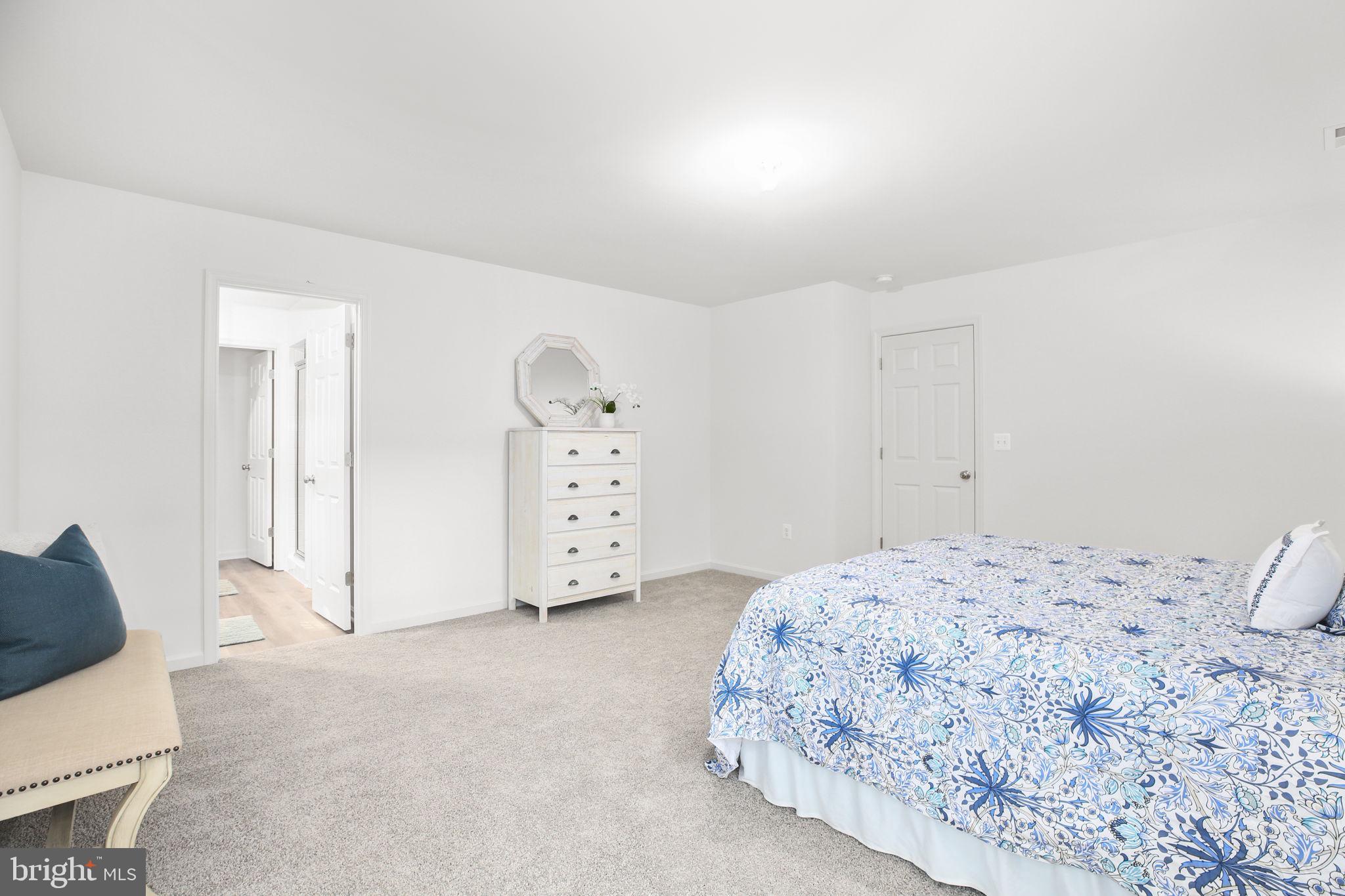 5 Indiantown Road King George, VA 22485 - Photo 17 of 18 a bedroom with a bed and a chair