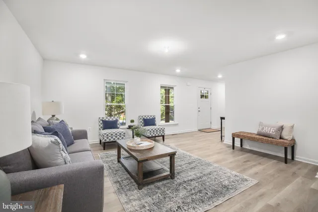 a living room with furniture and a couch