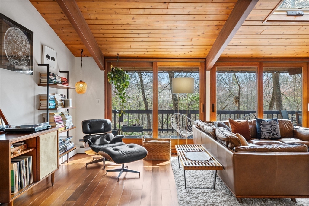 16 Belvedere Road Boxford, MA 01921 - Photo 12 of 35 a living room with furniture a rug potted plant and a large window