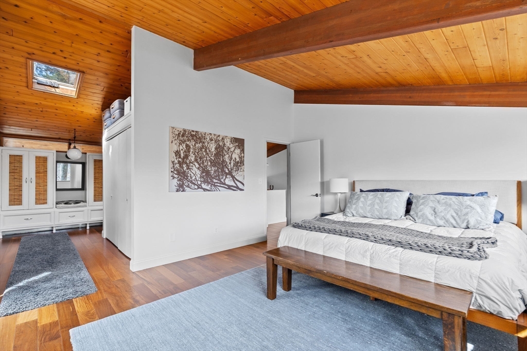16 Belvedere Road Boxford, MA 01921 - Photo 13 of 35 a bedroom with a bed and lamp