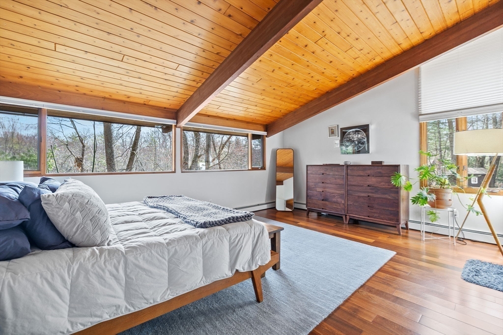 16 Belvedere Road Boxford, MA 01921 - Photo 14 of 35 a bedroom with a bed window and a table