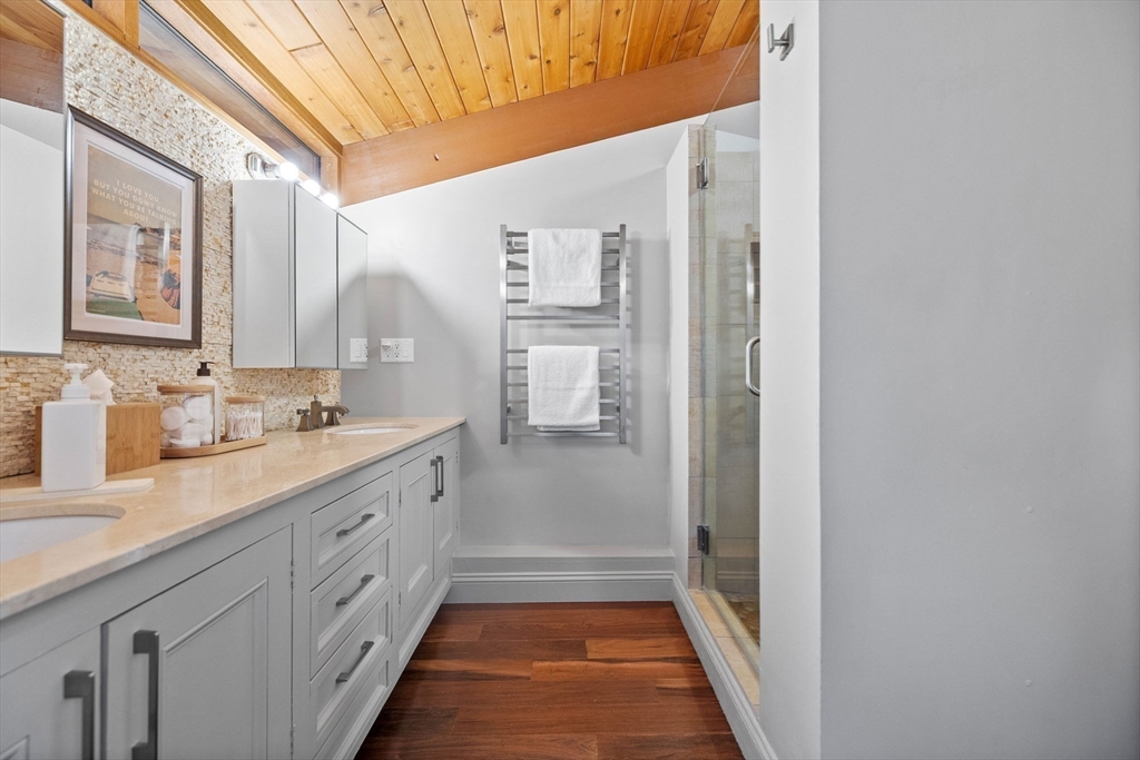 16 Belvedere Road Boxford, MA 01921 - Photo 16 of 35 a bathroom with double vanity and a mirror