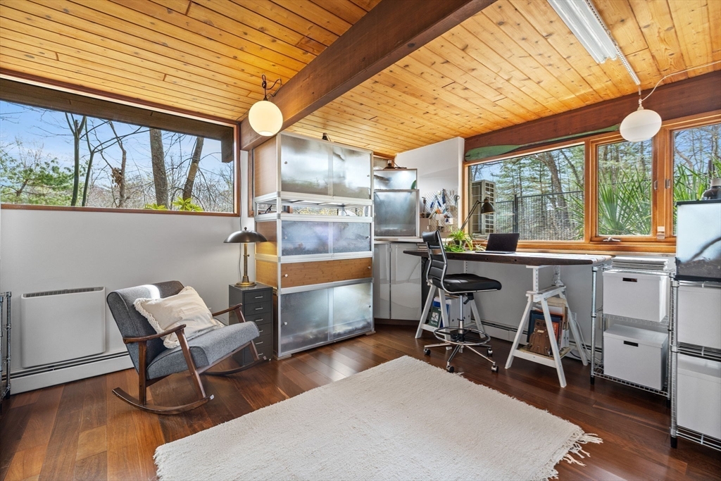 16 Belvedere Road Boxford, MA 01921 - Photo 24 of 35 a room with stainless steel appliances kitchen island granite countertop furniture and a large window