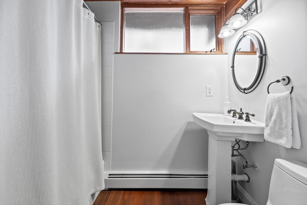 16 Belvedere Road Boxford, MA 01921 - Photo 26 of 35 a bathroom with a sink a mirror and a toilet