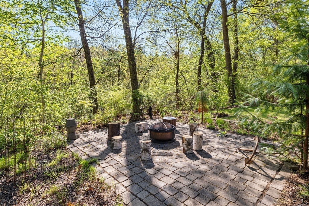 16 Belvedere Road Boxford, MA 01921 - Photo 32 of 35 a view of a patio with table and chairs and potted plants