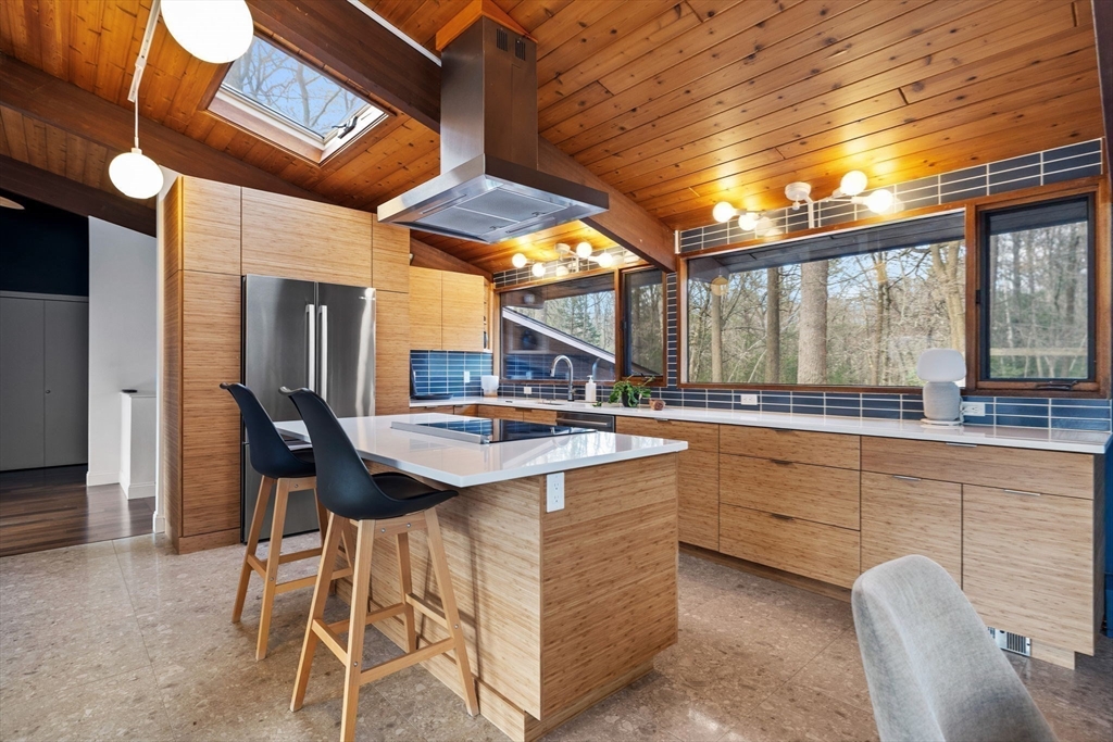 16 Belvedere Road Boxford, MA 01921 - Photo 4 of 35 a kitchen with a sink and chairs