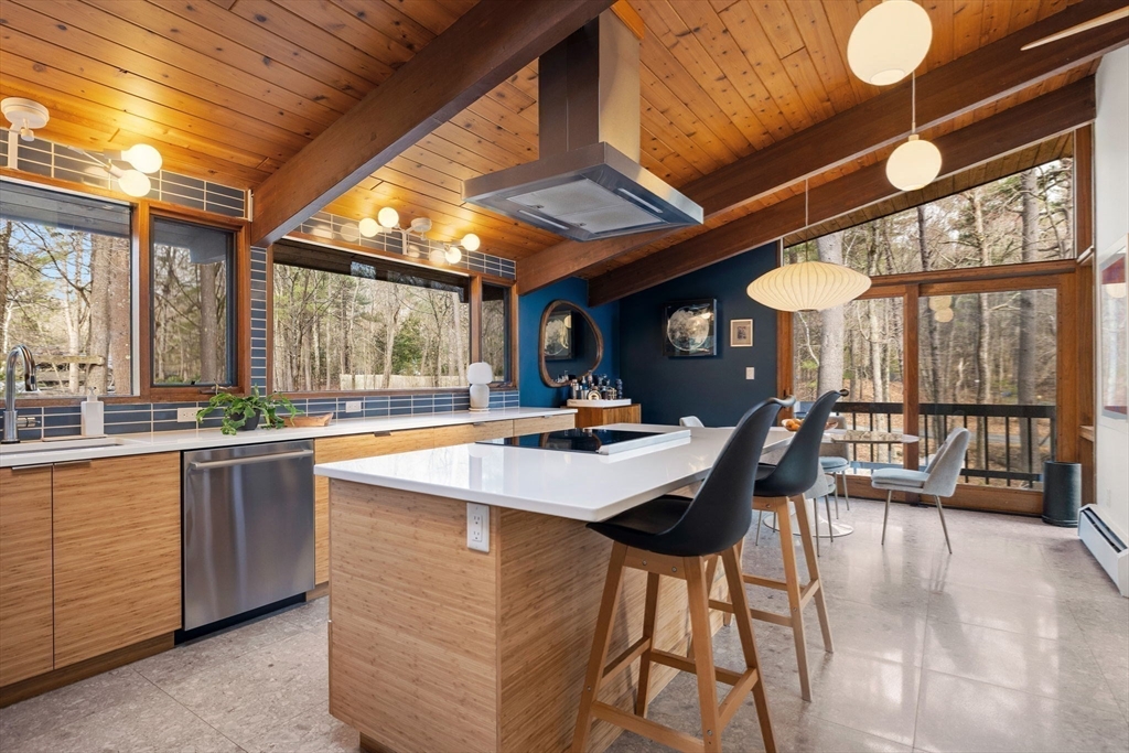 16 Belvedere Road Boxford, MA 01921 - Photo 5 of 35 a kitchen with stainless steel appliances granite countertop a table chairs and a wooden cabinets