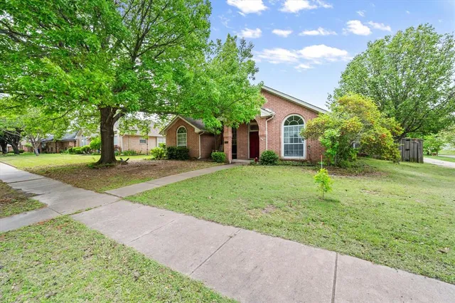 a house view with a garden space