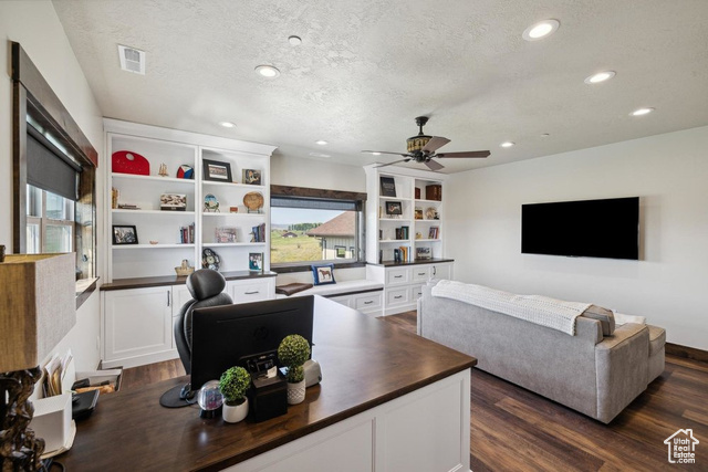6117 North Rocky Ridge Road Peoa, UT 84061 - Photo 47 of 83 Living room featuring ceiling fan, dark hardwood / wood-style floors, and a textured ceiling