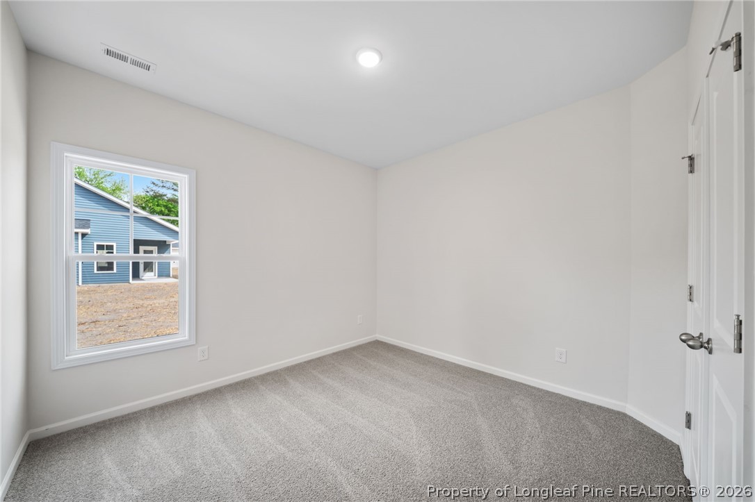 4052 Lofton Street Wade, NC 28395 - Photo 14 of 22 wooden floor in an empty room